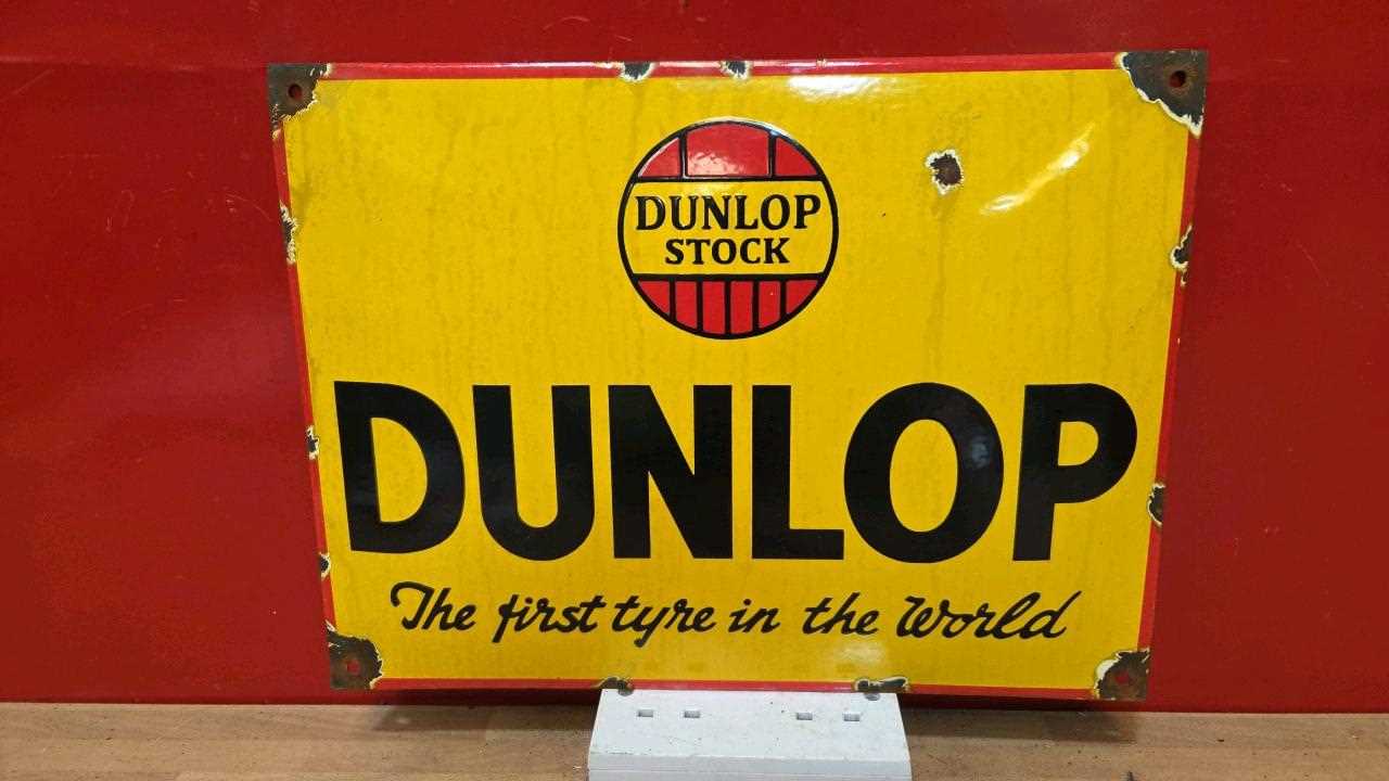 Lot 25 - DUNLOP STOCK ENAMEL SIGN 16" X 12"