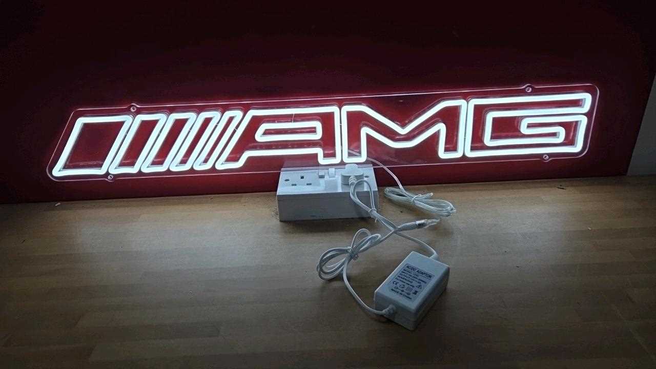 Lot 103 - WHITE NEON AMG LIGHT UP SIGN 32