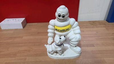 Lot 239 - CAST MICHELIN MAN & DOG 9" TALL