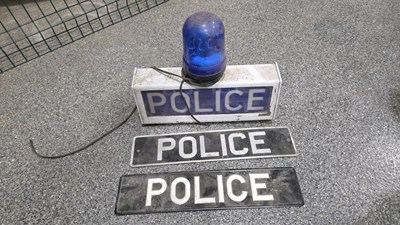 Lot 201 - POLICE CAR TOP WITH BLUE LIGHT AND PAIR OF PLATES