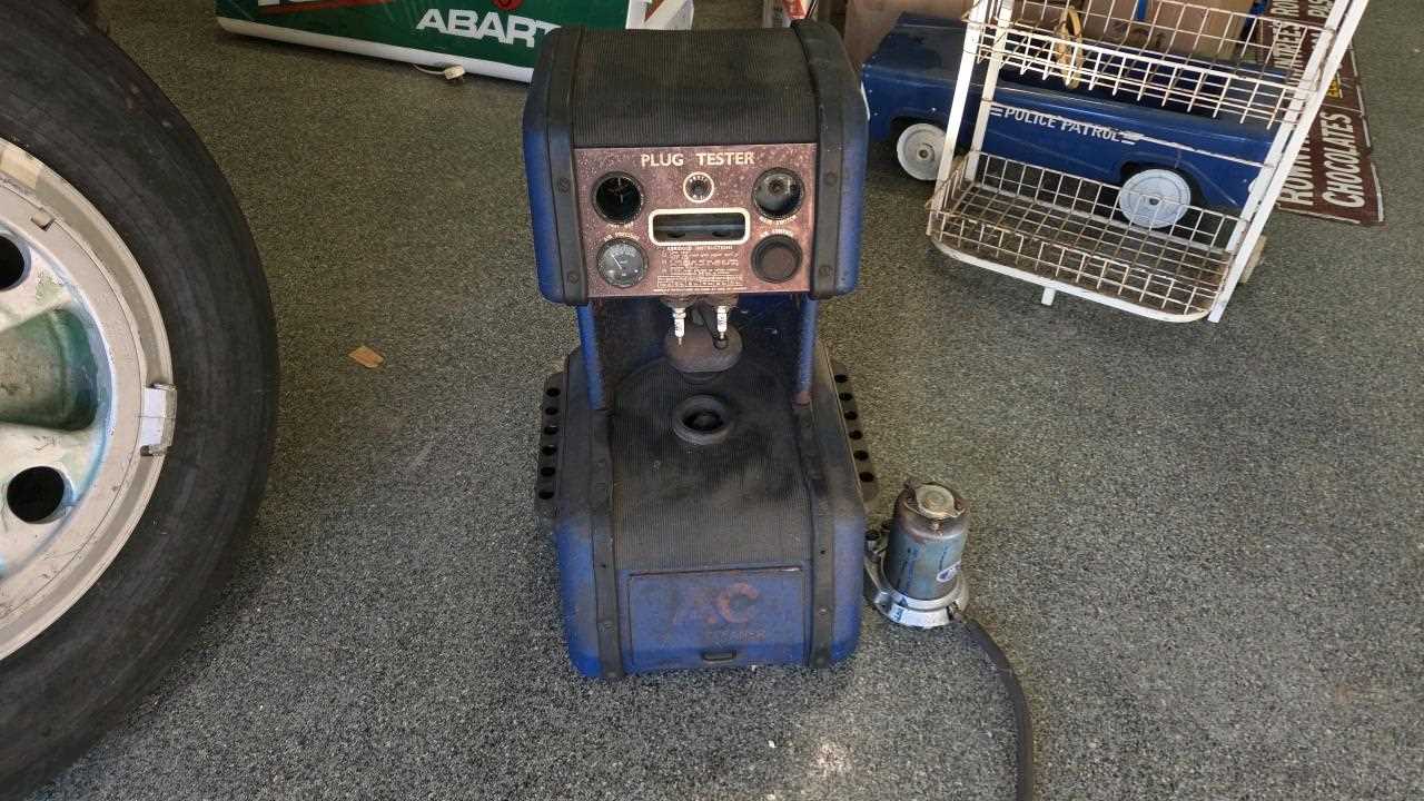 Lot 57 - SPARK PLUG TESTER & PLUG CLEANER