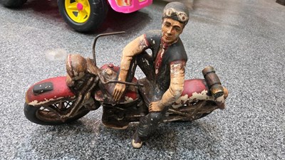 Lot 773 - WOODEN MAN ON A MOTOR BIKE ORNAMENT
