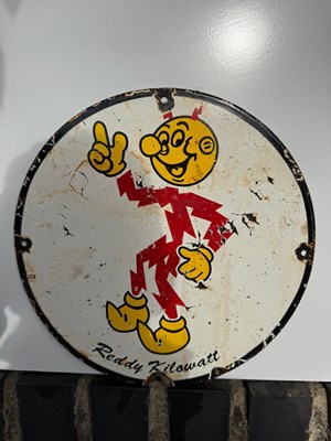 Lot 235 - REDDY KILOWATT ENAMEL SIGN 12" DIA