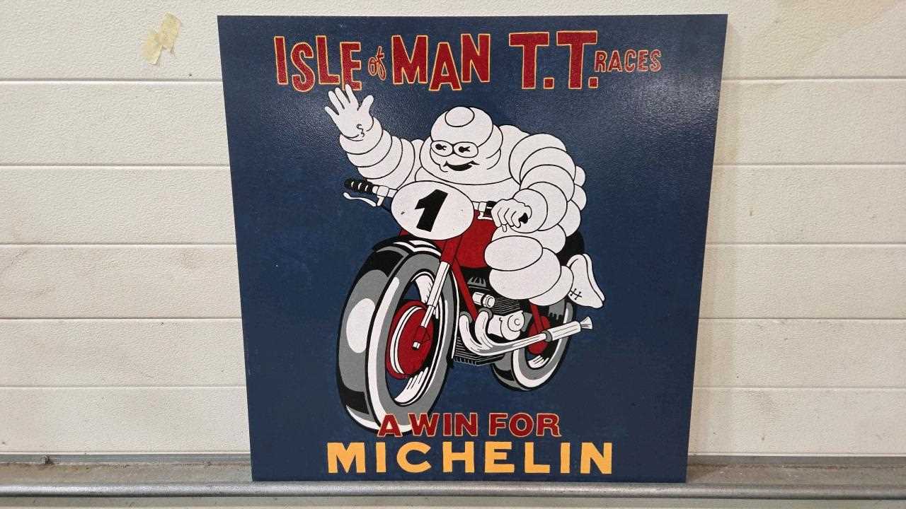 Lot 39 - WOODEN HAND PAINTED MICHELIN ISLE OF MAN SIGN 28" X 28"