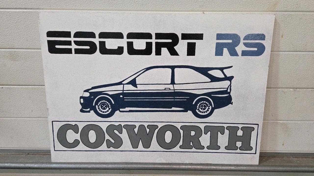 Lot 49 - HAND PAINTED WOODEN ESCORT RS COSWORTH SIGN-ALL PROCEEDS TO CHARITY