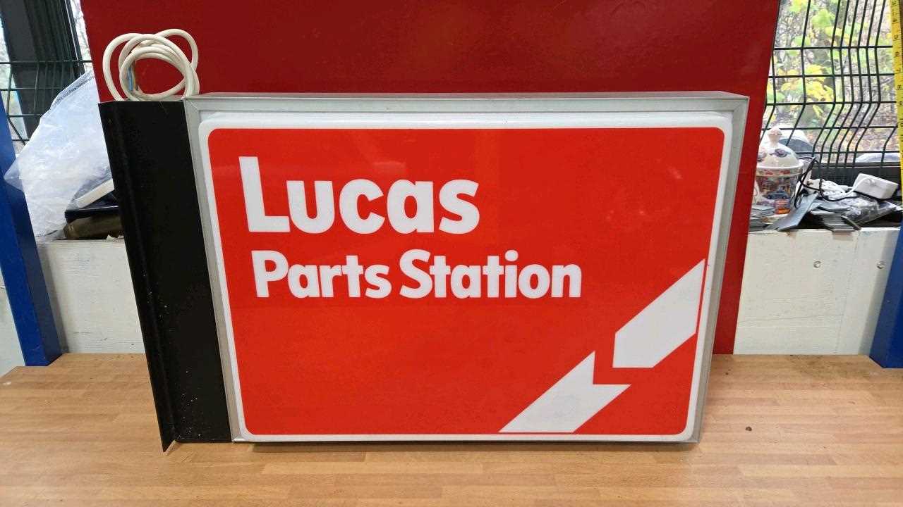 Lot 69 - LUCAS PARTS STATION , DOUBLE SIDED LIGHT UP SIGN 28" X 18"