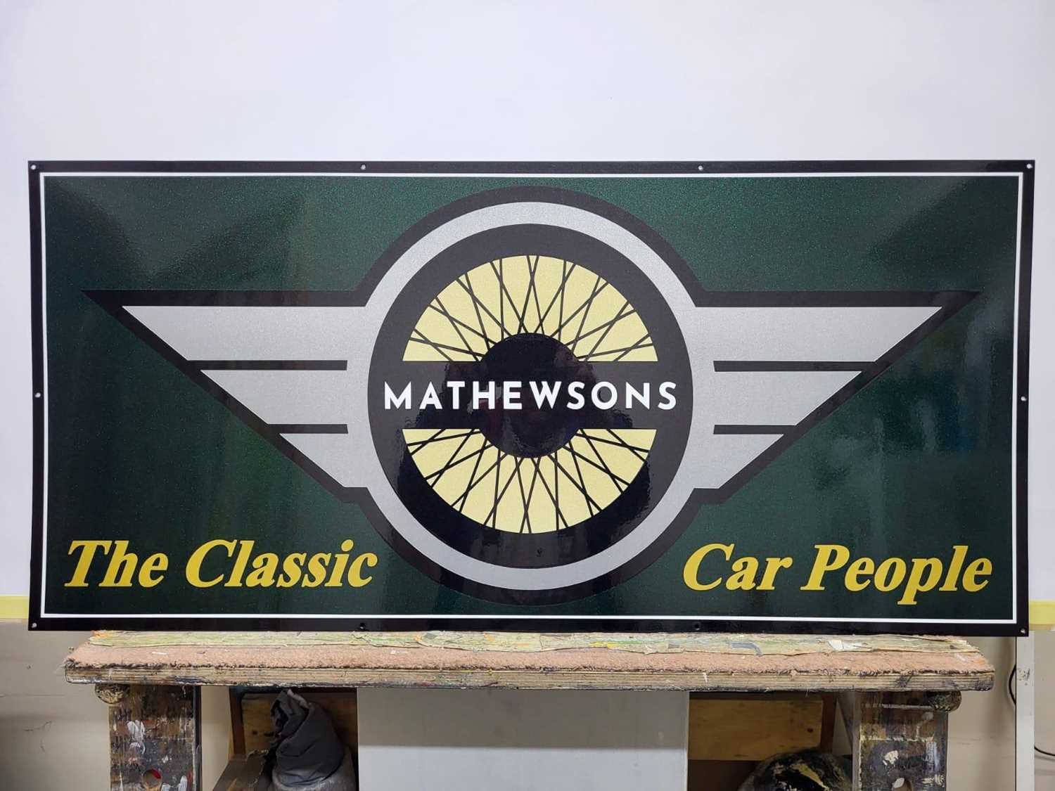 Lot 67 - HAND PAINTED MATHEWSONS METAL SIGN 41" X 19"