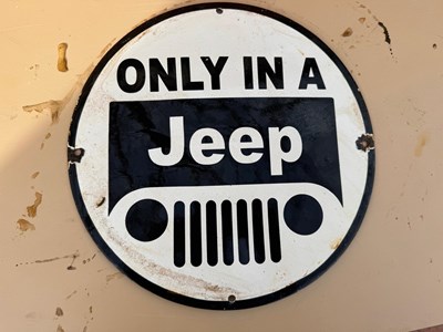 Lot 63 - ONLY IN A JEEP ENAMEL REPRODUCTION SIGN 12" DIA