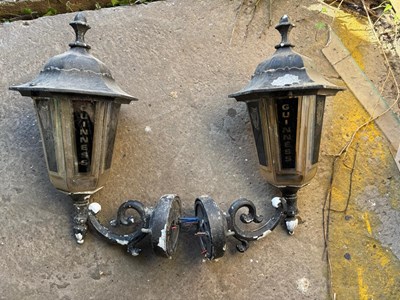 Lot 669 - PAIR OF GUINNESS WALL LAMPS 12" X 18"