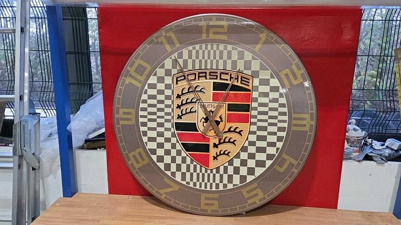 Lot 87 - HANDMADE 32" PORSCHE PASHA CLOCK-AL PROCEEDS TO CHARITY
