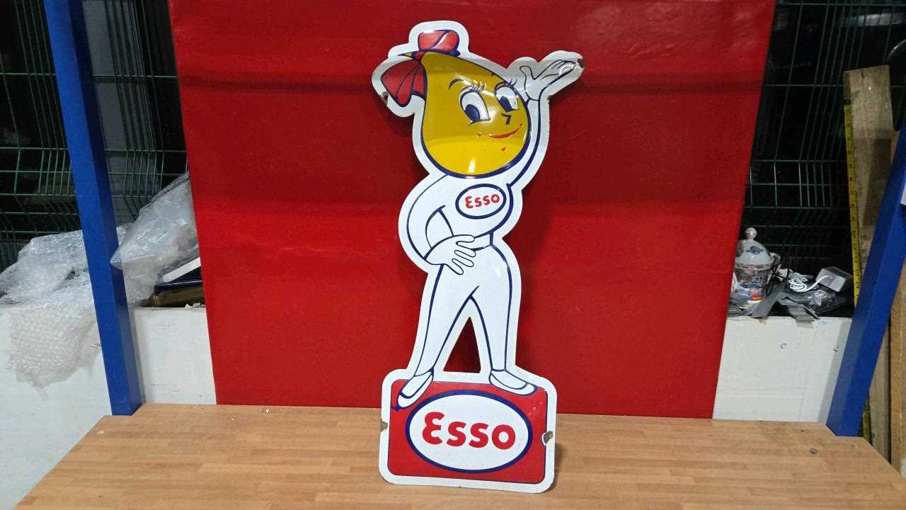 Lot 43 - ESSO MRS DRIP REPRODUCTION ENAMEL SIGN 32" X 12"