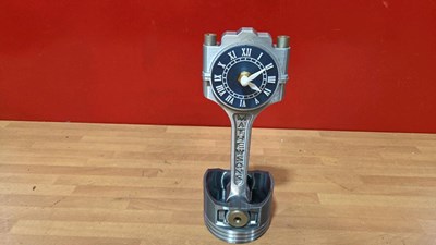 Lot 699 - CONROD CLOCK 10" TALL