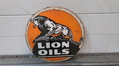 Lot 347 - LIONS OIL REPRODUCTION ENAMEL SIGN 12" DIA