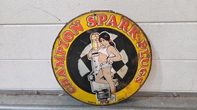 Lot 647 - CHAMPION SPARK PLUGS REPRODUCTION ENAMEL SIGN 12" DIA