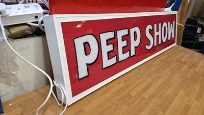 Lot 109 - ILLUMINATED PEEP SHOW SIGN 47" X 12"