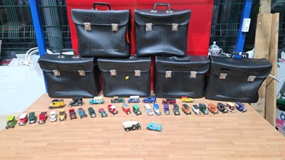 Lot 887 - VINTAGE CYCLE PANNIERS & BOX OF MODEL CARS