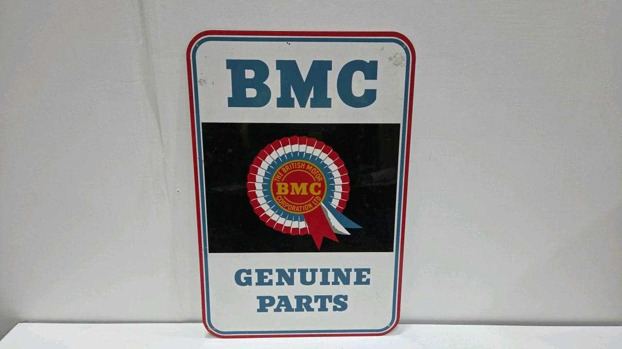 Lot 217 - BMC GENUINE PARTS TIN SIGN 27