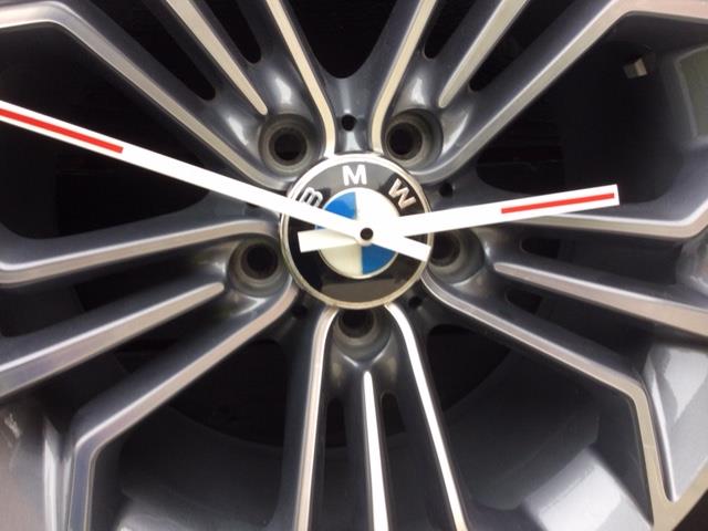Lot 171 - BMW ALLOY WHEEL CLOCK