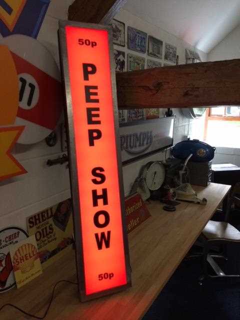 Lot 411 - ILLUMINATED PEEP SHOW SIGN