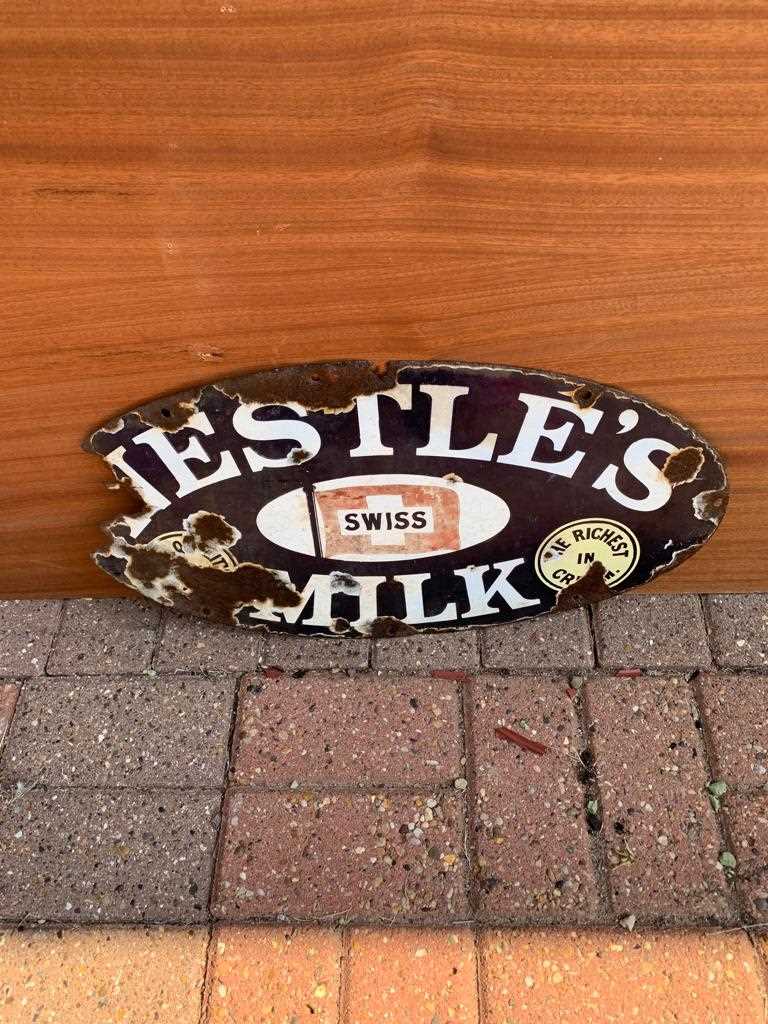 Lot 371 - OVAL ENAMEL NESTLE MILK SIGN