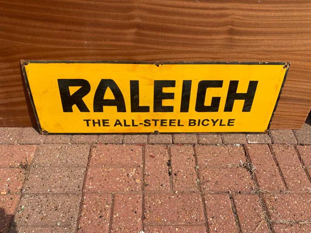 Lot 69 - ENAMEL RALEIGH BIKE SIGN