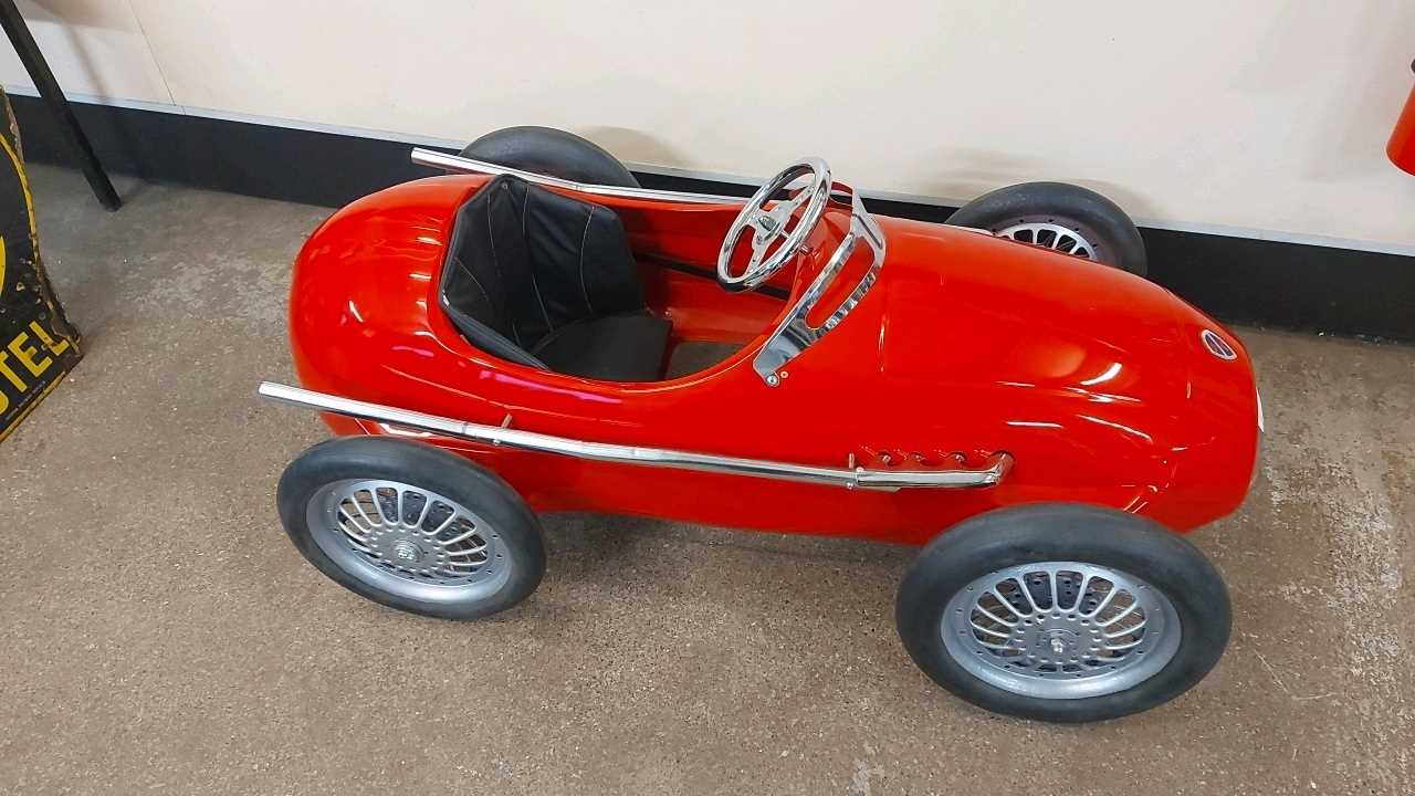 Lot 385 RED PEDAL CAR