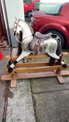 Lot 562 - ROCKING HORSE WITH REAL SADDLE