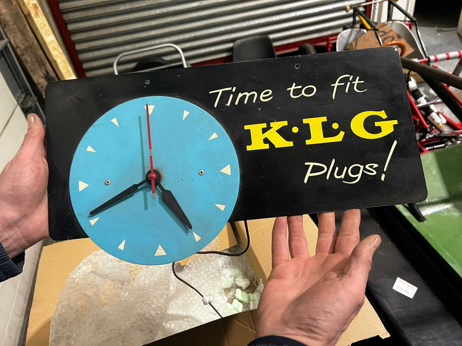 Lot 299 K.L.G PLUGS CLOCK