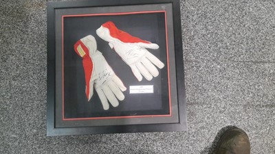 Lot 409 - FRAMED SIGNED FERRARI GLOVES - IRVINE & SCHUMACHER