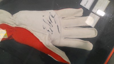 Lot 409 - FRAMED SIGNED FERRARI GLOVES - IRVINE & SCHUMACHER