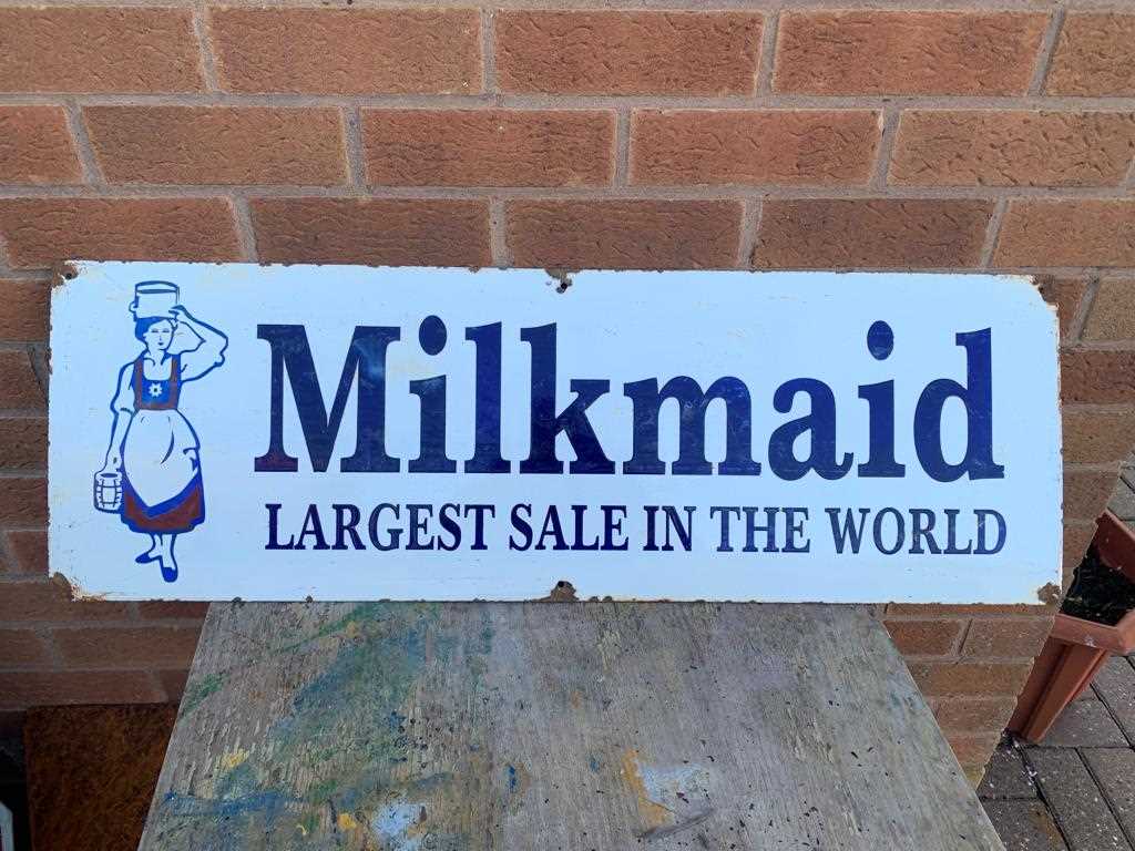 Lot 483 - ENAMEL MILK MAID SIGN