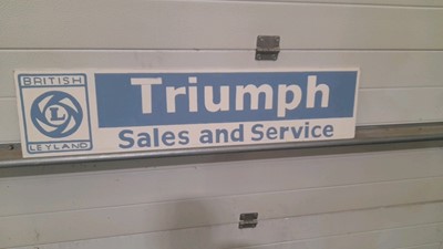 Lot 675 - WOODEN HAND PAINTED TRIUMPH SIGN