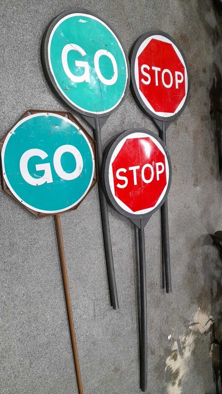 Lot 615 - 4 X ROAD WORKS STOP AND GO SIGN